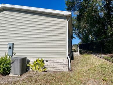 This 3 Bedroom 2 Bath home has been meticulously kept and is on Water Oak Country Club Estates in Florida - for sale on GolfHomes.com, golf home, golf lot