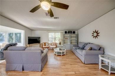 Remodeled with a new roof, new garage for golf cart, and a on Lake Fairways Country Club in Florida - for sale on GolfHomes.com, golf home, golf lot