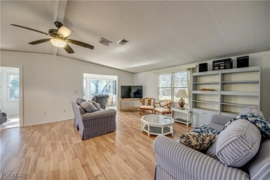 Remodeled with a new roof, new garage for golf cart, and a on Lake Fairways Country Club in Florida - for sale on GolfHomes.com, golf home, golf lot