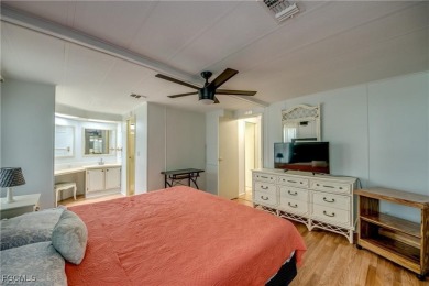 Remodeled with a new roof, new garage for golf cart, and a on Lake Fairways Country Club in Florida - for sale on GolfHomes.com, golf home, golf lot