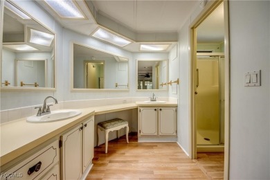 Remodeled with a new roof, new garage for golf cart, and a on Lake Fairways Country Club in Florida - for sale on GolfHomes.com, golf home, golf lot