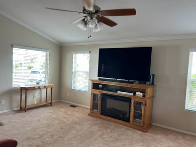 SPECTACULAR 2 BEDROOM, 2.5 BATH, MOVE-IN READY ON 17TH HOLE ON on Deer Creek RV Golf Resort in Florida - for sale on GolfHomes.com, golf home, golf lot