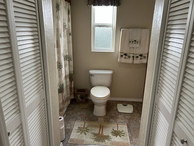 SPECTACULAR 2 BEDROOM, 2.5 BATH, MOVE-IN READY ON 17TH HOLE ON on Deer Creek RV Golf Resort in Florida - for sale on GolfHomes.com, golf home, golf lot