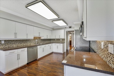 Freshly Painted, Laminate Floors Built-in Bar. Kitchen with on Boca Pointe Country Club in Florida - for sale on GolfHomes.com, golf home, golf lot