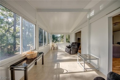 Remodeled with a new roof, new garage for golf cart, and a on Lake Fairways Country Club in Florida - for sale on GolfHomes.com, golf home, golf lot