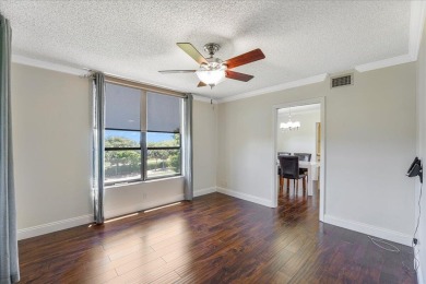 Freshly Painted, Laminate Floors Built-in Bar. Kitchen with on Boca Pointe Country Club in Florida - for sale on GolfHomes.com, golf home, golf lot