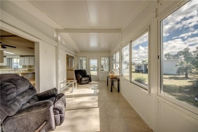 Remodeled with a new roof, new garage for golf cart, and a on Lake Fairways Country Club in Florida - for sale on GolfHomes.com, golf home, golf lot