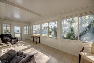 Remodeled with a new roof, new garage for golf cart, and a on Lake Fairways Country Club in Florida - for sale on GolfHomes.com, golf home, golf lot