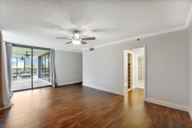 Freshly Painted, Laminate Floors Built-in Bar. Kitchen with on Boca Pointe Country Club in Florida - for sale on GolfHomes.com, golf home, golf lot