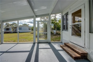 Remodeled with a new roof, new garage for golf cart, and a on Lake Fairways Country Club in Florida - for sale on GolfHomes.com, golf home, golf lot