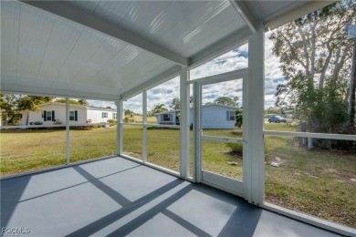 Remodeled with a new roof, new garage for golf cart, and a on Lake Fairways Country Club in Florida - for sale on GolfHomes.com, golf home, golf lot