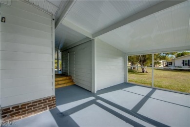 Remodeled with a new roof, new garage for golf cart, and a on Lake Fairways Country Club in Florida - for sale on GolfHomes.com, golf home, golf lot