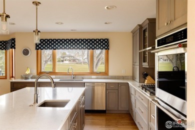 Golf Course Living in The Island at Coal Creek Ranch!Discover on Coal Creek Golf Course in Colorado - for sale on GolfHomes.com, golf home, golf lot