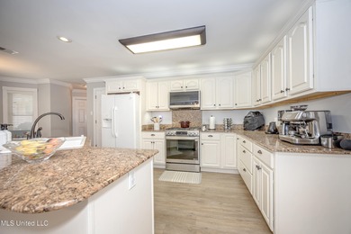 WELCOME HOME! This beautiful well maintained home sits on a on Diamondhead Country Club in Mississippi - for sale on GolfHomes.com, golf home, golf lot