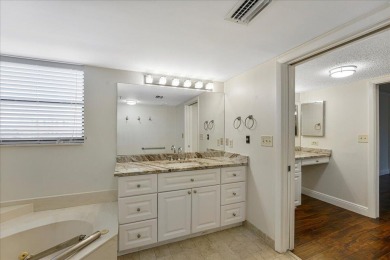 Freshly Painted, Laminate Floors Built-in Bar. Kitchen with on Boca Pointe Country Club in Florida - for sale on GolfHomes.com, golf home, golf lot