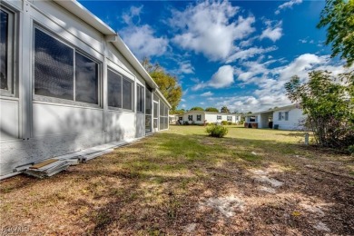 Remodeled with a new roof, new garage for golf cart, and a on Lake Fairways Country Club in Florida - for sale on GolfHomes.com, golf home, golf lot