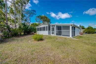 Remodeled with a new roof, new garage for golf cart, and a on Lake Fairways Country Club in Florida - for sale on GolfHomes.com, golf home, golf lot