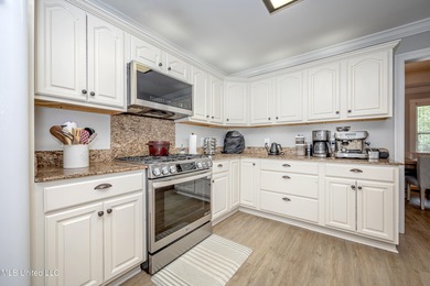 WELCOME HOME! This beautiful well maintained home sits on a on Diamondhead Country Club in Mississippi - for sale on GolfHomes.com, golf home, golf lot