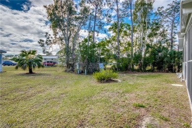 Remodeled with a new roof, new garage for golf cart, and a on Lake Fairways Country Club in Florida - for sale on GolfHomes.com, golf home, golf lot