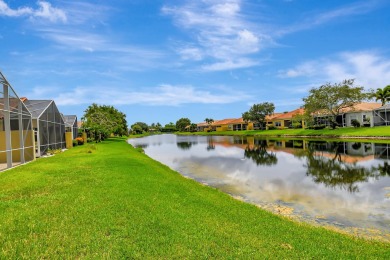 Nestled on a spectacular private tropically landscaped lot with on Gleneagles Golf and Country Club in Florida - for sale on GolfHomes.com, golf home, golf lot