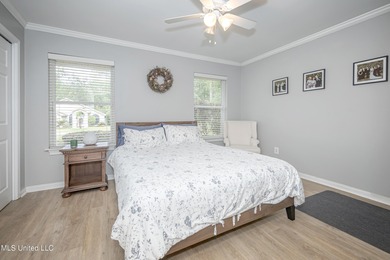 WELCOME HOME! This beautiful well maintained home sits on a on Diamondhead Country Club in Mississippi - for sale on GolfHomes.com, golf home, golf lot