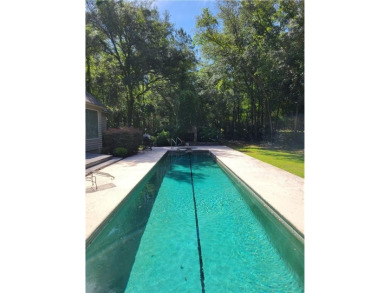 This lovely home is located in the beautiful Okefenokee Golf and on Okefenokee Country Club in Georgia - for sale on GolfHomes.com, golf home, golf lot