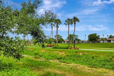 Nestled on a spectacular private tropically landscaped lot with on Gleneagles Golf and Country Club in Florida - for sale on GolfHomes.com, golf home, golf lot