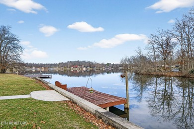 Wake up to shimmering water views and spend your evenings on Lake Tansi Village Country Club in Tennessee - for sale on GolfHomes.com, golf home, golf lot