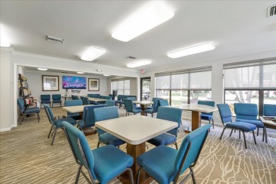 Freshly Painted, Laminate Floors Built-in Bar. Kitchen with on Boca Pointe Country Club in Florida - for sale on GolfHomes.com, golf home, golf lot