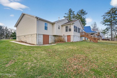 Wake up to shimmering water views and spend your evenings on Lake Tansi Village Country Club in Tennessee - for sale on GolfHomes.com, golf home, golf lot