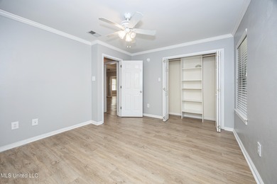 WELCOME HOME! This beautiful well maintained home sits on a on Diamondhead Country Club in Mississippi - for sale on GolfHomes.com, golf home, golf lot