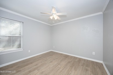 WELCOME HOME! This beautiful well maintained home sits on a on Diamondhead Country Club in Mississippi - for sale on GolfHomes.com, golf home, golf lot