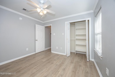 WELCOME HOME! This beautiful well maintained home sits on a on Diamondhead Country Club in Mississippi - for sale on GolfHomes.com, golf home, golf lot