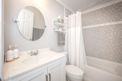 WELCOME HOME! This beautiful well maintained home sits on a on Diamondhead Country Club in Mississippi - for sale on GolfHomes.com, golf home, golf lot