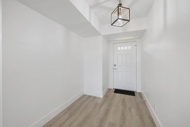 MOTIVATED SELLER! Step into this beautifully reimagined on Turtle Creek Club in Florida - for sale on GolfHomes.com, golf home, golf lot