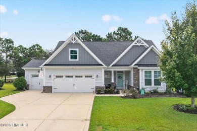 This beautifully maintained home sits directly on the golf on Beau Rivage Golf and Resort in North Carolina - for sale on GolfHomes.com, golf home, golf lot