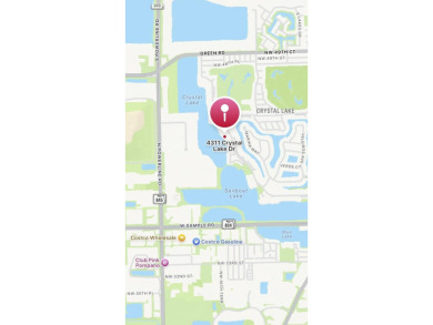 *WINCAST ARM COMMUNITY* BEAUTIFUL CORNER UNIT- FIRST FLOOR - on Crystal Lake Country Club in Florida - for sale on GolfHomes.com, golf home, golf lot