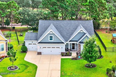 This beautifully maintained home sits directly on the golf on Beau Rivage Golf and Resort in North Carolina - for sale on GolfHomes.com, golf home, golf lot