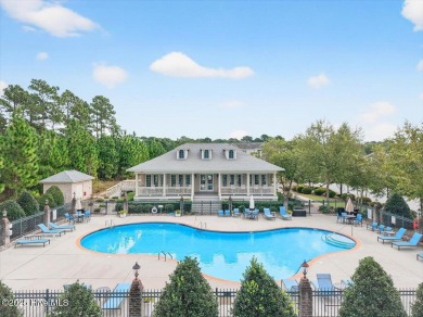 This beautifully maintained home sits directly on the golf on Beau Rivage Golf and Resort in North Carolina - for sale on GolfHomes.com, golf home, golf lot
