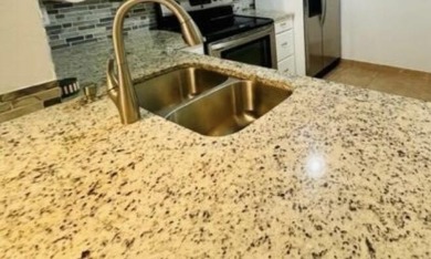 *WINCAST ARM COMMUNITY* BEAUTIFUL CORNER UNIT- FIRST FLOOR - on Crystal Lake Country Club in Florida - for sale on GolfHomes.com, golf home, golf lot