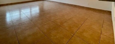 *WINCAST ARM COMMUNITY* BEAUTIFUL CORNER UNIT- FIRST FLOOR - on Crystal Lake Country Club in Florida - for sale on GolfHomes.com, golf home, golf lot