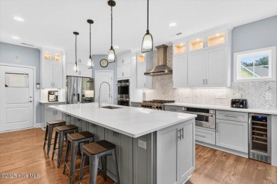 This beautifully maintained home sits directly on the golf on Beau Rivage Golf and Resort in North Carolina - for sale on GolfHomes.com, golf home, golf lot