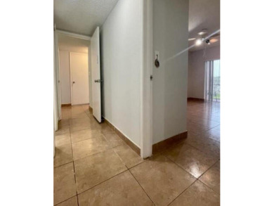 *WINCAST ARM COMMUNITY* BEAUTIFUL CORNER UNIT- FIRST FLOOR - on Crystal Lake Country Club in Florida - for sale on GolfHomes.com, golf home, golf lot