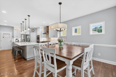 This beautifully maintained home sits directly on the golf on Beau Rivage Golf and Resort in North Carolina - for sale on GolfHomes.com, golf home, golf lot