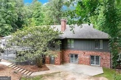 A Timeless Treasure in Chattahoochee Estates    Set on a on Chattahoochee Golf Course in Georgia - for sale on GolfHomes.com, golf home, golf lot