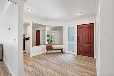 Coastal luxury living meets serenity and comfort in this on IMG Academies Golf and Country Club in Florida - for sale on GolfHomes.com, golf home, golf lot