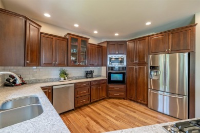 Spacious, well-appointed,  impeccably kept, this 5-bedroom home on Bill Roberts Municipal Golf Course in Montana - for sale on GolfHomes.com, golf home, golf lot