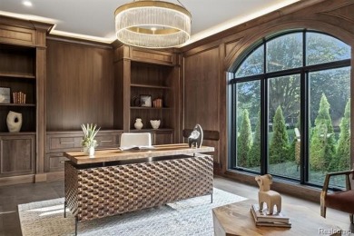 Set on over two acres along the coveted shores of all-sports on Orchard Lake Country Club in Michigan - for sale on GolfHomes.com, golf home, golf lot