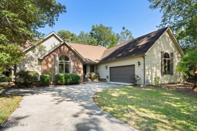 Opportunity awaits on the 7th tee! This spacious home in the on Olde Point Golf and Country Club in North Carolina - for sale on GolfHomes.com, golf home, golf lot