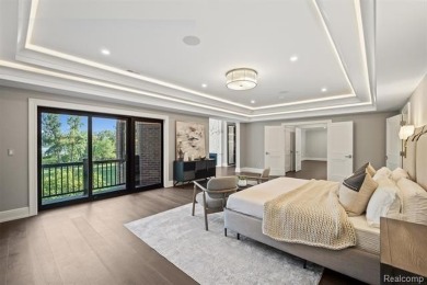 Set on over two acres along the coveted shores of all-sports on Orchard Lake Country Club in Michigan - for sale on GolfHomes.com, golf home, golf lot